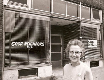 Good Neighbors founder in front of first location